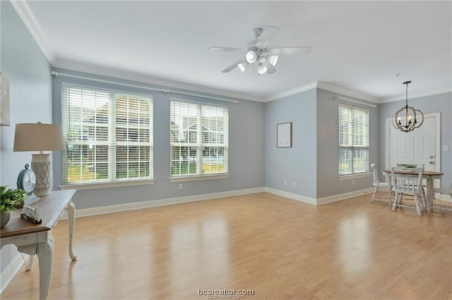 801 Luther St W Unit 407, College Station, TX 77840 - living area with healthy amount of natural light, a chandelier, ornamental molding, and light wood-type flooring