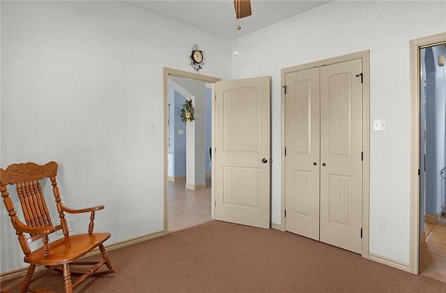 10175 Steep Hollow Rd, Bryan, TX 77808 - sitting room with light colored carpet, light tile patterned flooring, ceiling fan, and baseboards