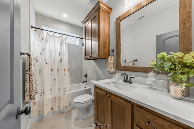 full bathroom with vanity, toilet, and shower / tub combo with curtain