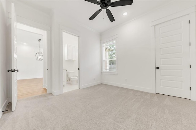 1701 Kerr Valley Ln, College Station, TX 77845 - unfurnished bedroom featuring light colored carpet, ensuite bathroom, crown molding, recessed lighting, and ceiling fan