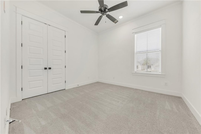 1701 Kerr Valley Ln, College Station, TX 77845 - unfurnished bedroom with carpet, a closet, crown molding, and ceiling fan