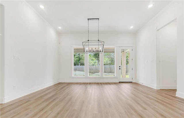 1701 Kerr Valley Ln, College Station, TX 77845 - spare room with a chandelier, recessed lighting, light wood-style floors, and ornamental molding