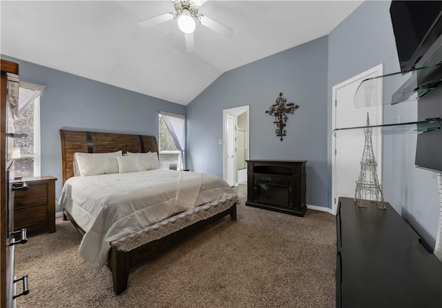 bedroom featuring vaulted ceiling, carpet, baseboards, and ceiling fan