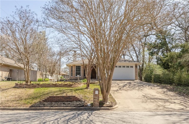 view of front of home with a front yard and driveway