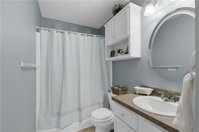 bathroom with toilet, vanity, and shower / bathtub combination with curtain