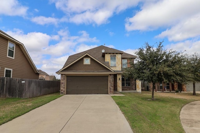 craftsman-style house featuring a garage and a front yard