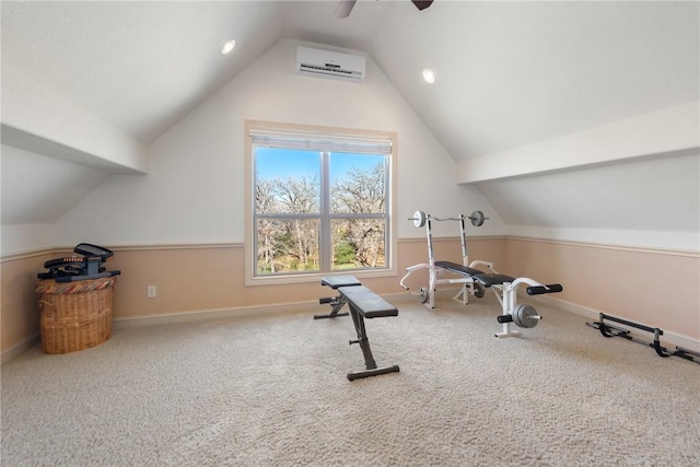 exercise area with carpet, lofted ceiling, an AC wall unit, ceiling fan, and baseboards