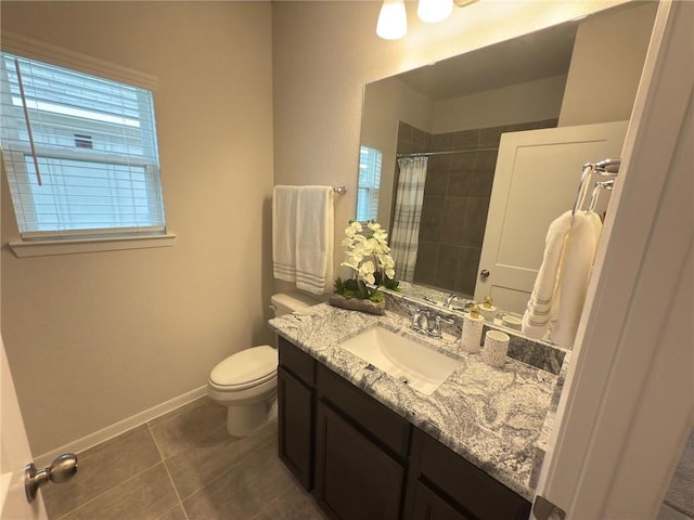 bathroom featuring a shower with curtain, tile patterned floors, toilet, and vanity