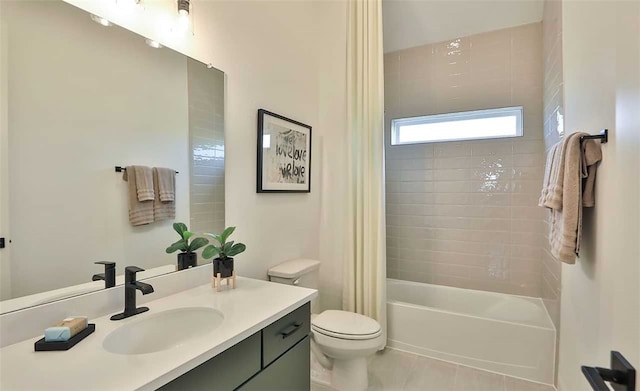 bathroom with toilet, tile patterned flooring, shower / tub combo with curtain, and vanity