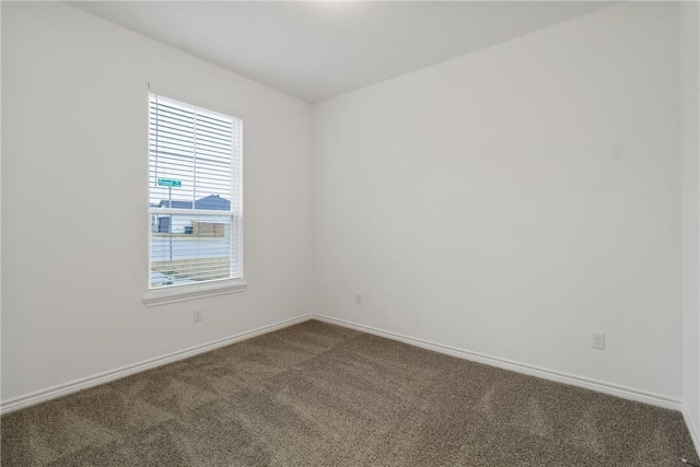 view of carpeted spare room