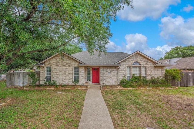 801 Camellia Ct, College Station, TX 77840 - view of front of home with brick siding and a shingled roof