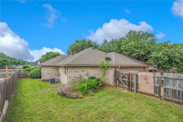 801 Camellia Ct, College Station, TX 77840 - view of property exterior with brick siding, a shingled roof, and central AC unit