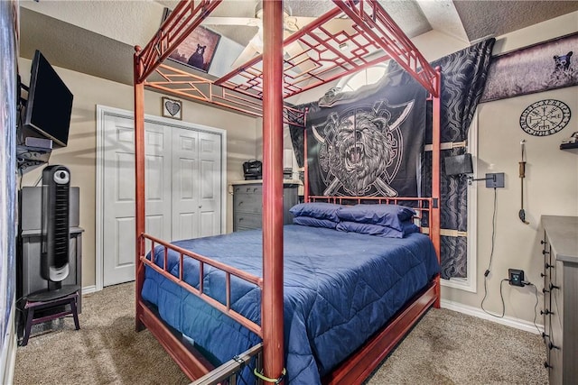 801 Camellia Ct, College Station, TX 77840 - carpeted bedroom with a textured ceiling and baseboards