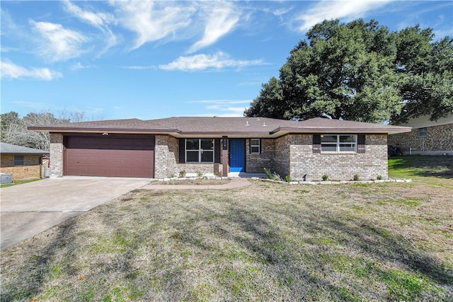 ranch-style house with a garage and a front yard