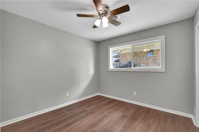 unfurnished room featuring hardwood / wood-style flooring and ceiling fan