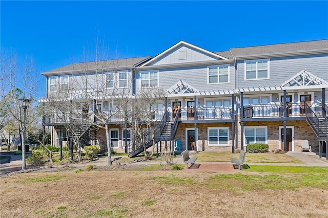 view of front of house featuring stairway