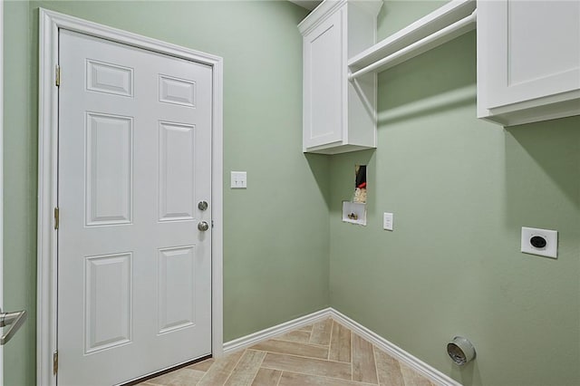 laundry room with hookup for an electric dryer, cabinets, and hookup for a washing machine