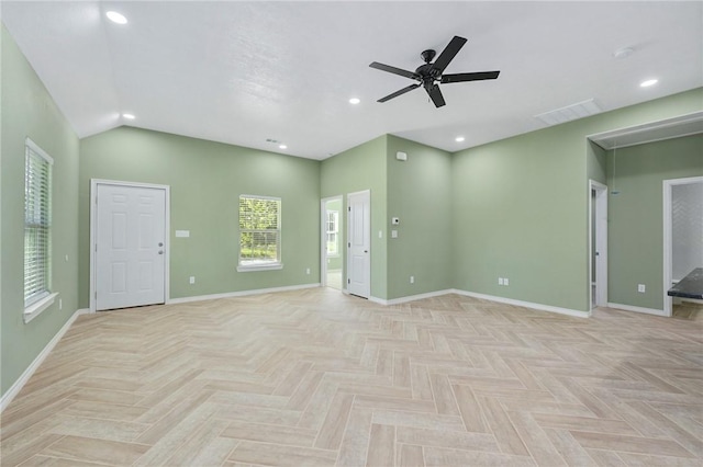 unfurnished living room featuring ceiling fan and light parquet floors