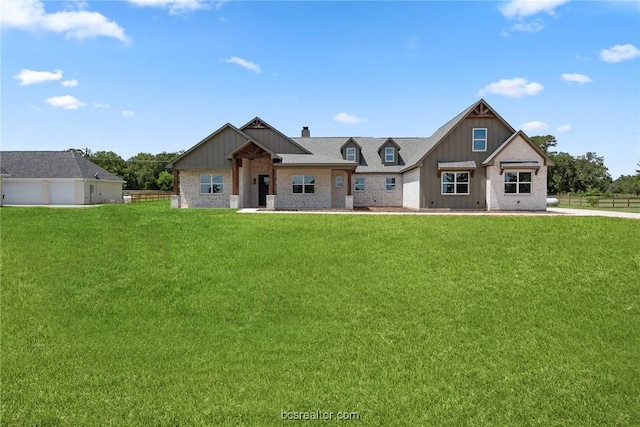 view of front of property with a front lawn