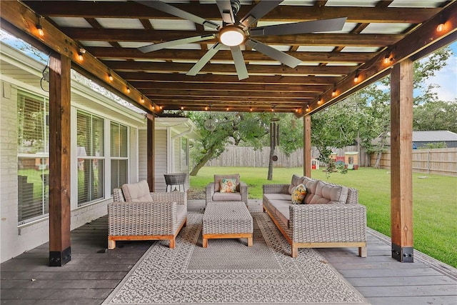 6866 Wooded Dr, College Station, TX 77845 - deck featuring a fenced backyard, an outdoor hangout area, and a ceiling fan