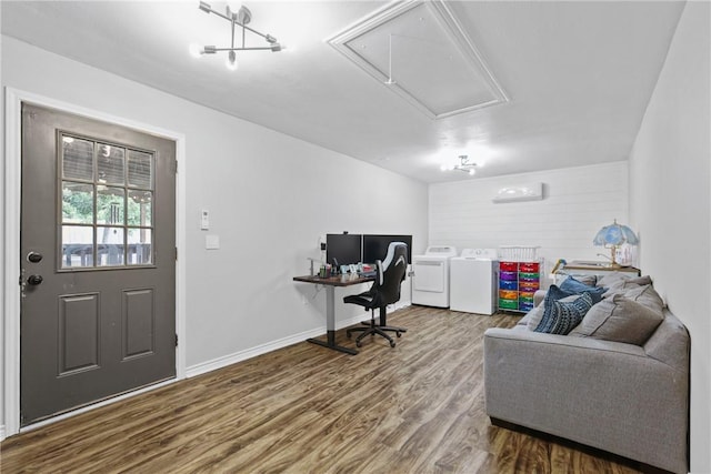 6866 Wooded Dr, College Station, TX 77845 - office space featuring attic access, separate washer and dryer, and wood finished floors
