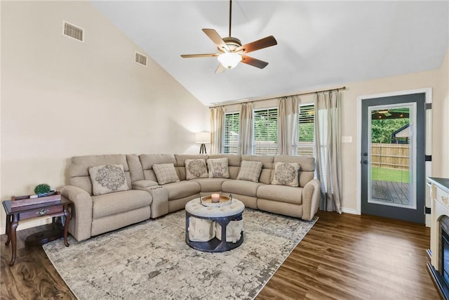 6866 Wooded Dr, College Station, TX 77845 - living room with healthy amount of natural light, a ceiling fan, wood finished floors, and high vaulted ceiling