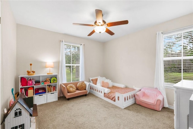 6866 Wooded Dr, College Station, TX 77845 - carpeted bedroom featuring a ceiling fan