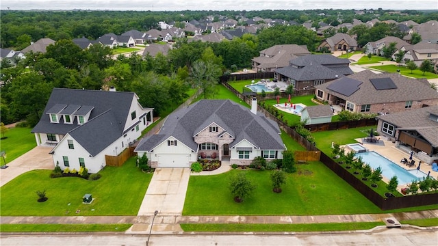 1909 Bareboot Trl, College Station, TX 77845 - aerial perspective of suburban area featuring a pool