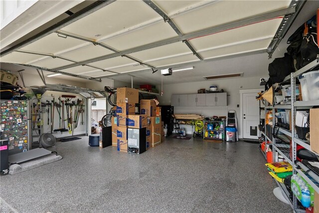 1909 Bareboot Trl, College Station, TX 77845 - garage featuring a garage door opener