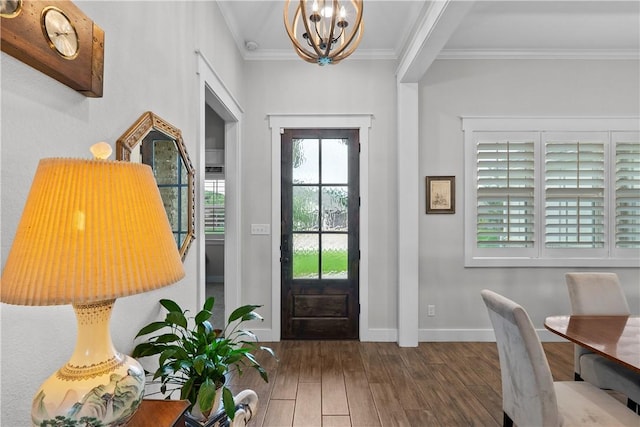 1909 Bareboot Trl, College Station, TX 77845 - foyer entrance with a chandelier, wood finished floors, and ornamental molding