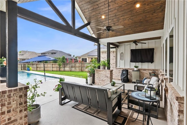 1909 Bareboot Trl, College Station, TX 77845 - fenced backyard with an outdoor hangout area, a patio area, and ceiling fan