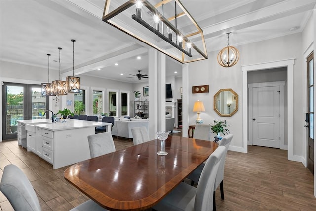1909 Bareboot Trl, College Station, TX 77845 - dining area featuring a chandelier, french doors, recessed lighting, a ceiling fan, and crown molding