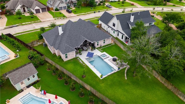 1909 Bareboot Trl, College Station, TX 77845 - aerial view of residential area with a pool