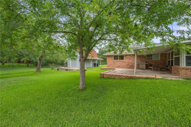 1003 Guadalupe Dr, College Station, TX 77840 - view of yard with a patio area and an outdoor structure