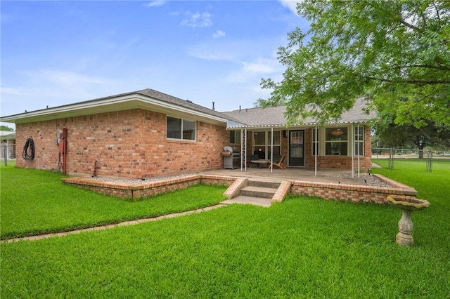 1003 Guadalupe Dr, College Station, TX 77840 - back of house with brick siding and a patio area