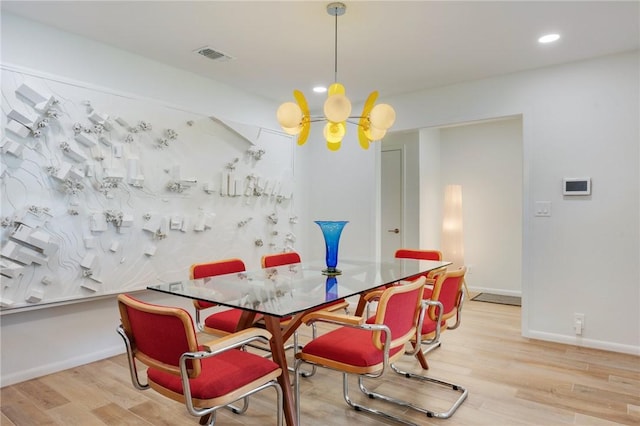 1003 Guadalupe Dr, College Station, TX 77840 - dining room with a chandelier, wood finished floors, and recessed lighting