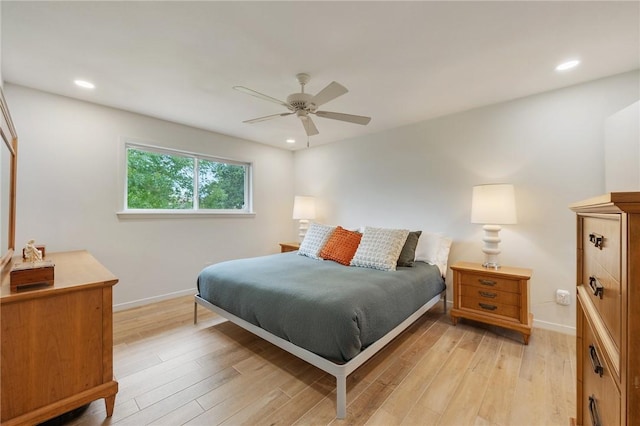 1003 Guadalupe Dr, College Station, TX 77840 - bedroom with light wood finished floors, recessed lighting, and ceiling fan
