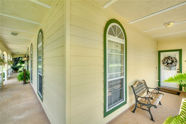 entrance to property with covered porch