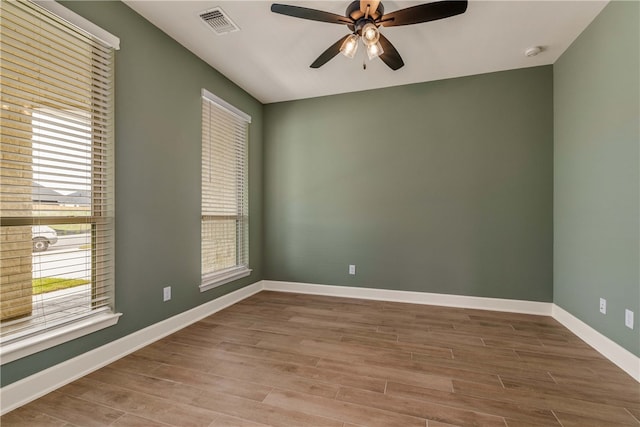3568 Chantilly Path, Bryan, TX 77808 - empty room featuring a ceiling fan, wood finished floors, and a smoke detector