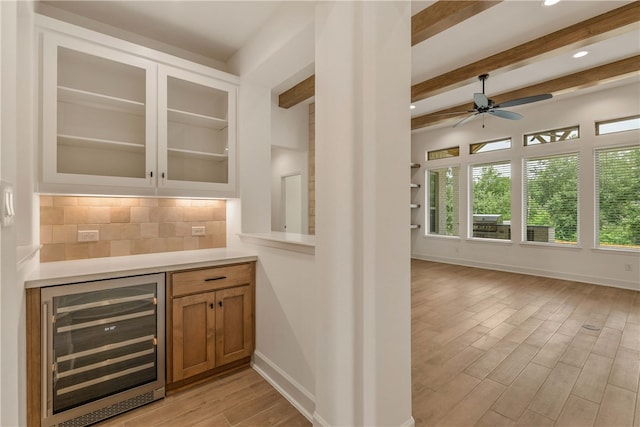3568 Chantilly Path, Bryan, TX 77808 - bar area with wine cooler, light wood finished floors, a ceiling fan, tasteful backsplash, and recessed lighting