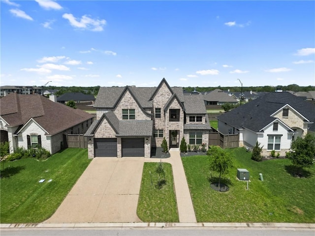 4209 Harding Ct, Bryan, TX 77802 - french country style house featuring stone siding, a residential view, driveway, a front lawn, and an attached garage