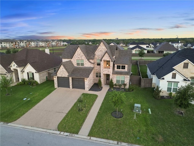 4209 Harding Ct, Bryan, TX 77802 - view of front facade with stone siding, a residential view, concrete driveway, and a shingled roof