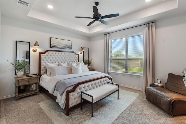 4209 Harding Ct, Bryan, TX 77802 - bedroom featuring a tray ceiling, light carpet, baseboards, ceiling fan, and recessed lighting