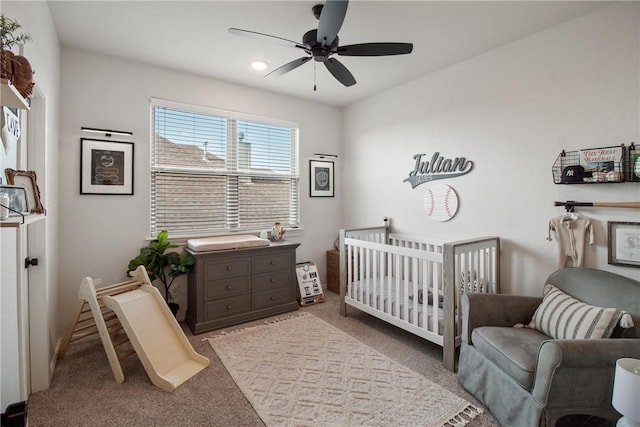 4209 Harding Ct, Bryan, TX 77802 - bedroom featuring carpet, a ceiling fan, a nursery area, and baseboards