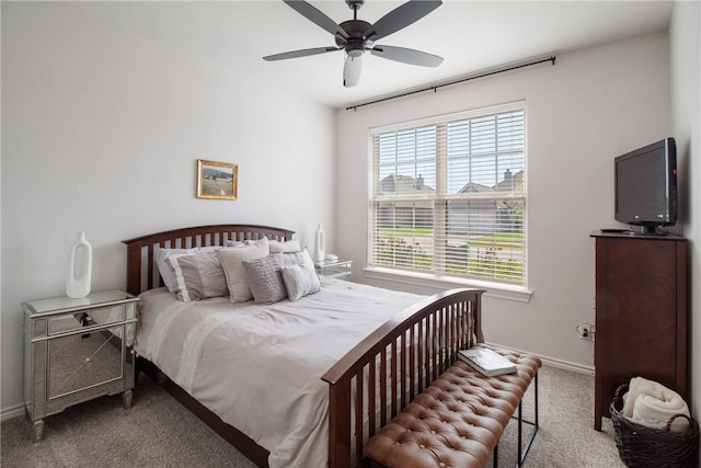 4209 Harding Ct, Bryan, TX 77802 - bedroom featuring carpet, baseboards, and a ceiling fan