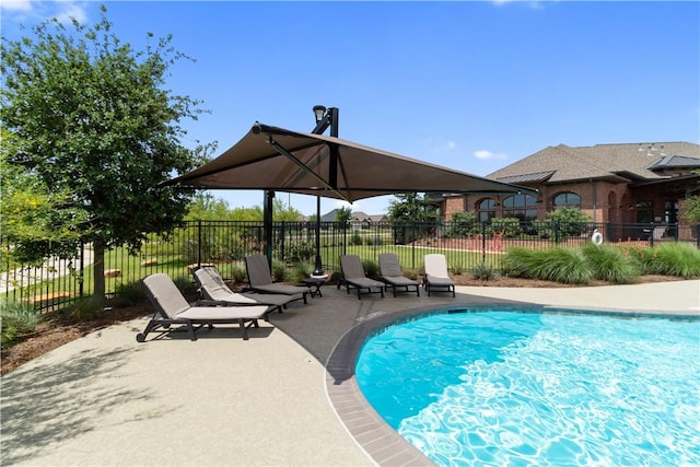 4209 Harding Ct, Bryan, TX 77802 - view of swimming pool featuring a patio and fence