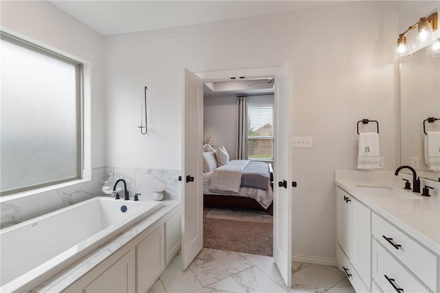 4209 Harding Ct, Bryan, TX 77802 - ensuite bathroom with marble finish floors, a bath, vanity, and baseboards