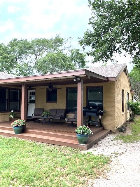 back of property with brick siding
