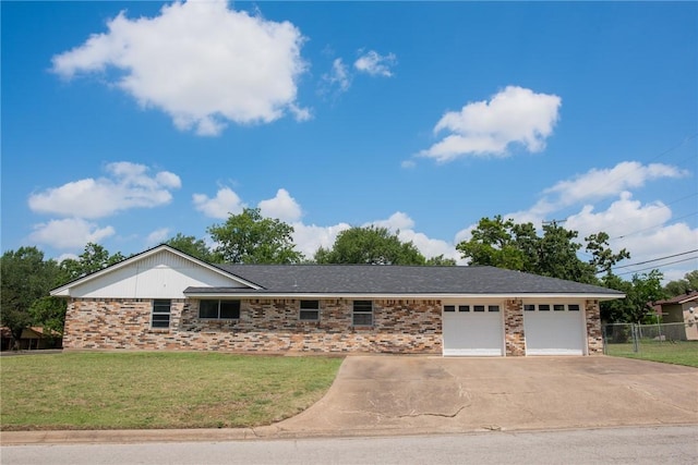 2323 Carter Creek Pkwy, Bryan, TX 77802 - ranch-style house with a garage, driveway, and brick siding