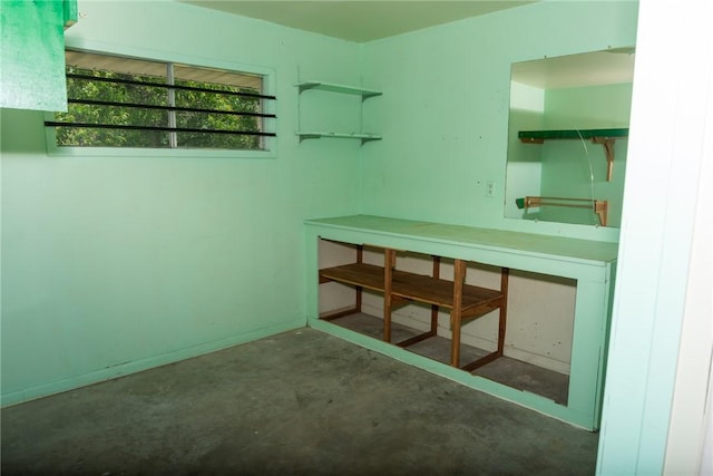 2323 Carter Creek Pkwy, Bryan, TX 77802 - unfurnished room featuring concrete flooring